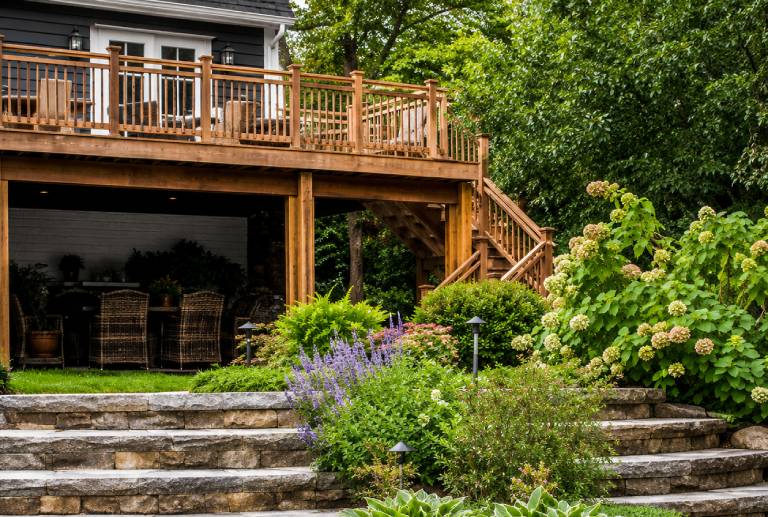 Wooden deck with lush garden